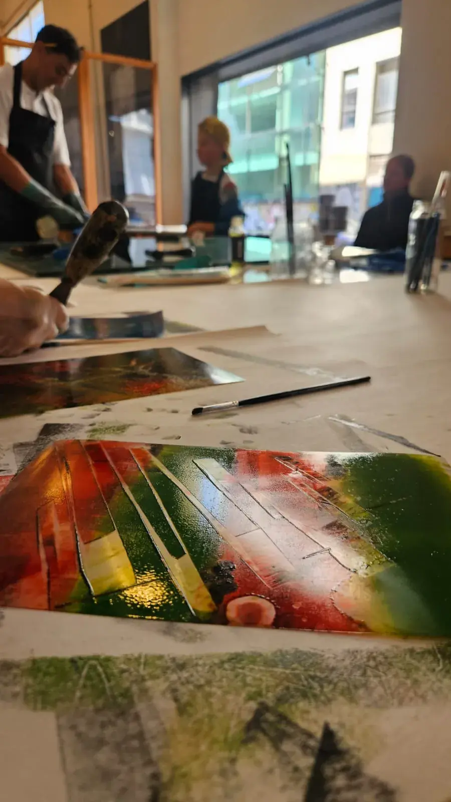 Ink being applied during a monotype printmaking workshop in Valparaiso