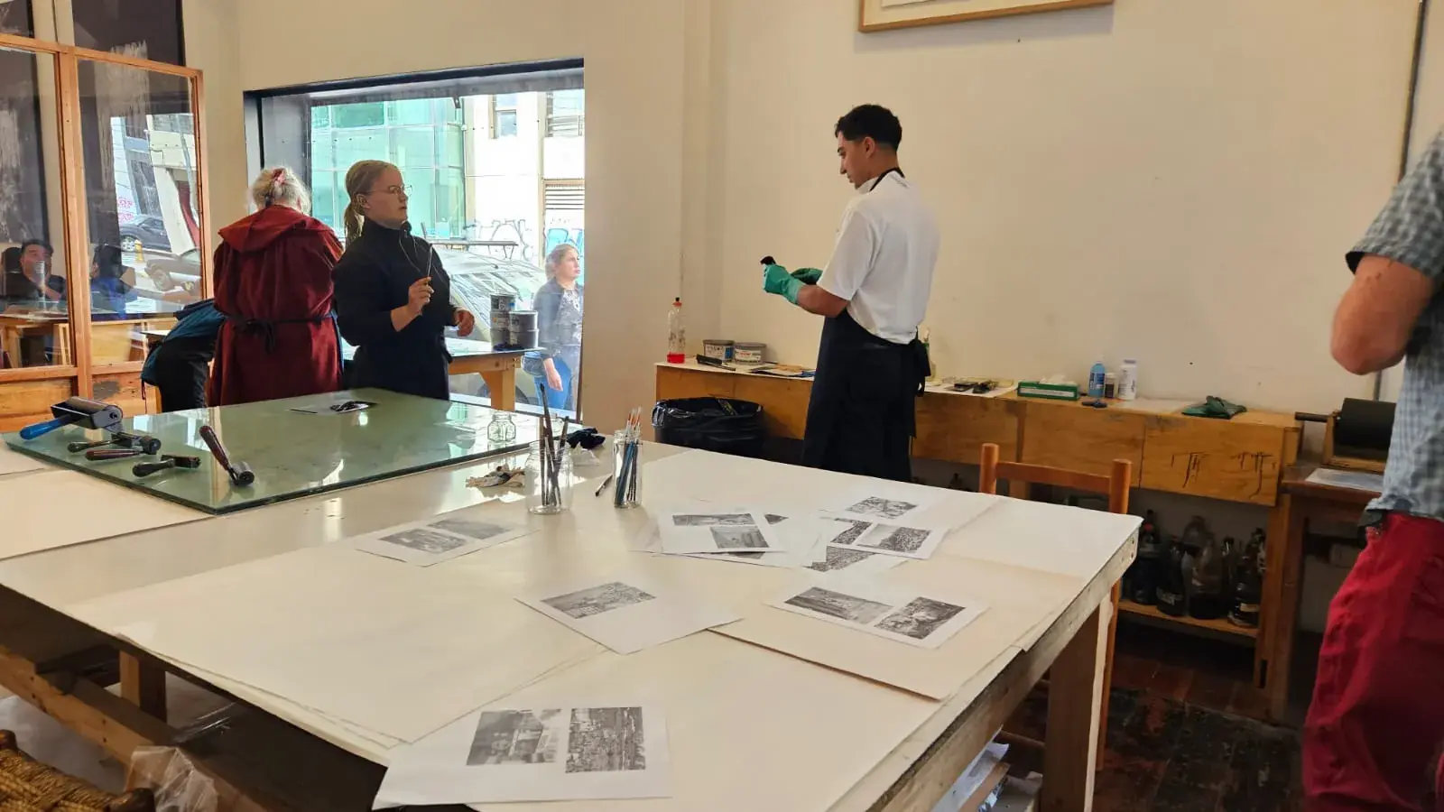 Guests participating in a printmaking workshop at CasaPlan studio in Valparaiso