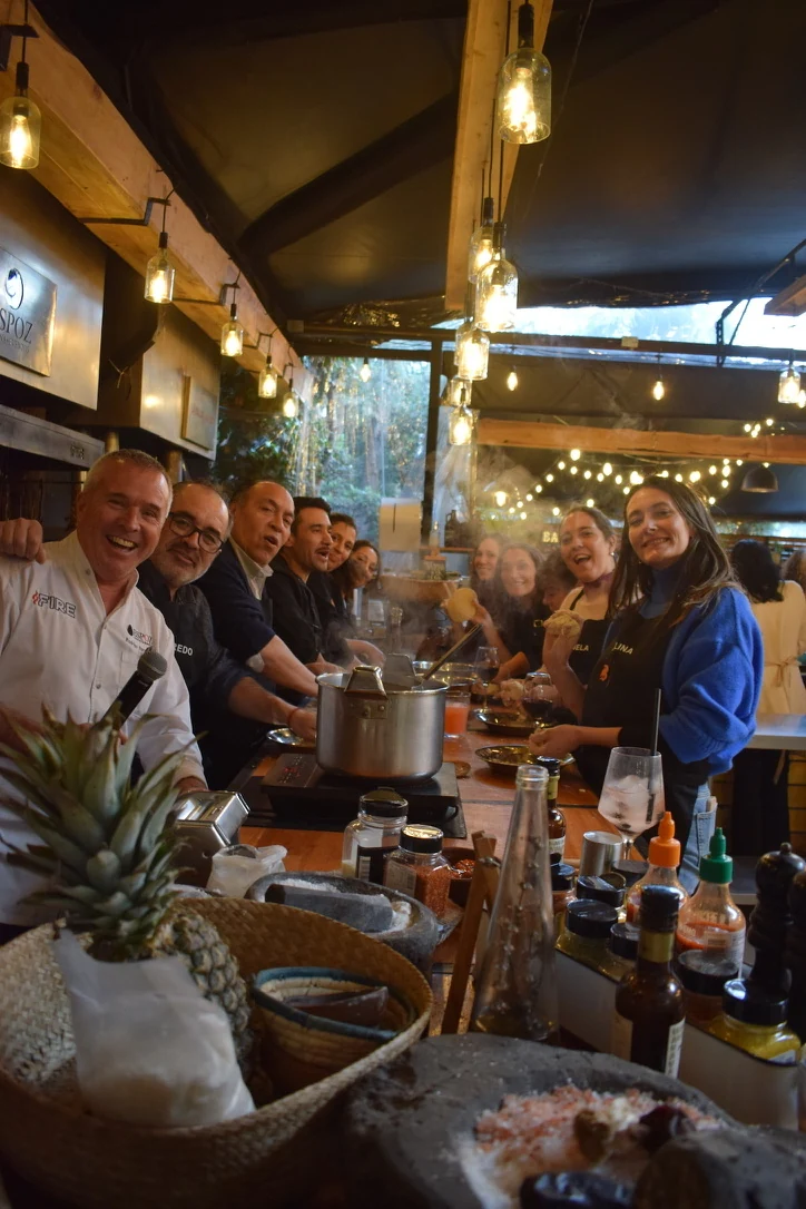 Cooking class group around a shared table in Santiago
