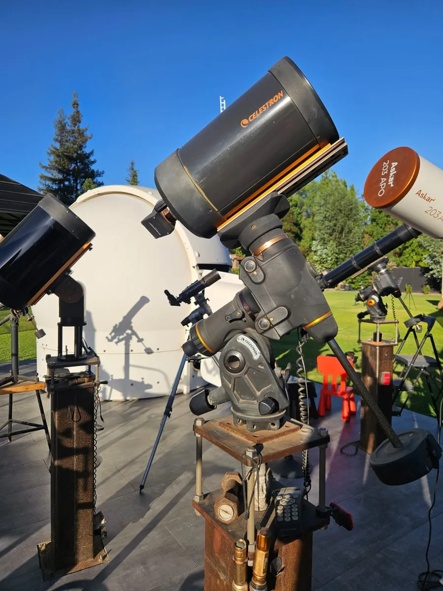 Celestron and Askar telescopes set up beside the observatory dome
