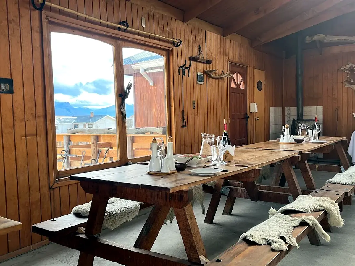 Rustic dining room of the ranch set for a Patagonian lamb lunch