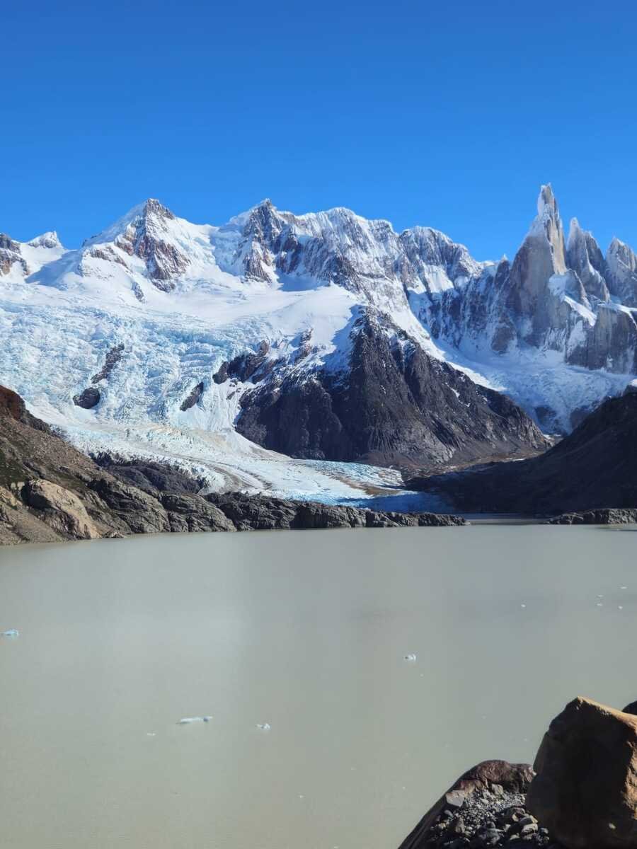 Cerro Torre spire and glacier above Laguna Torre on a clear day