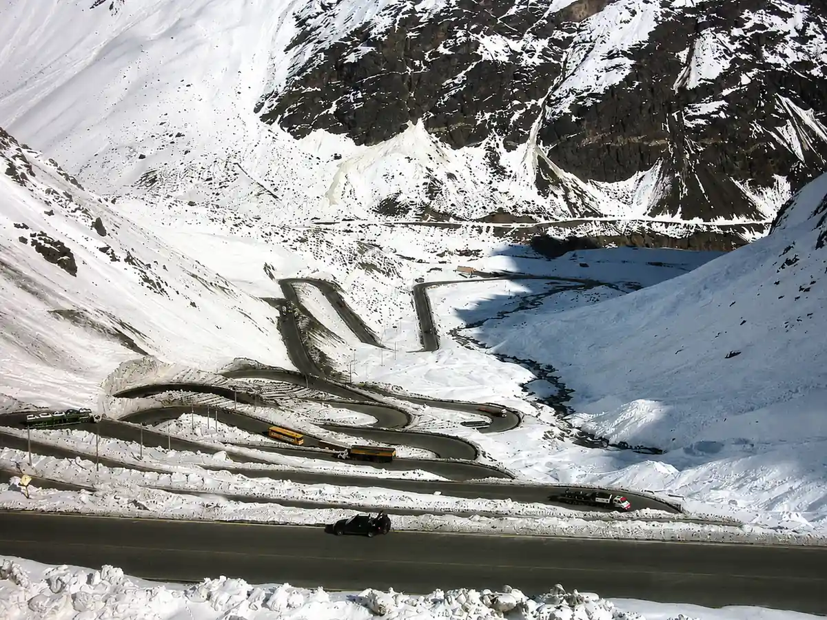 The Caracoles switchbacks under deep snow in winter on the Los Libertadores pass