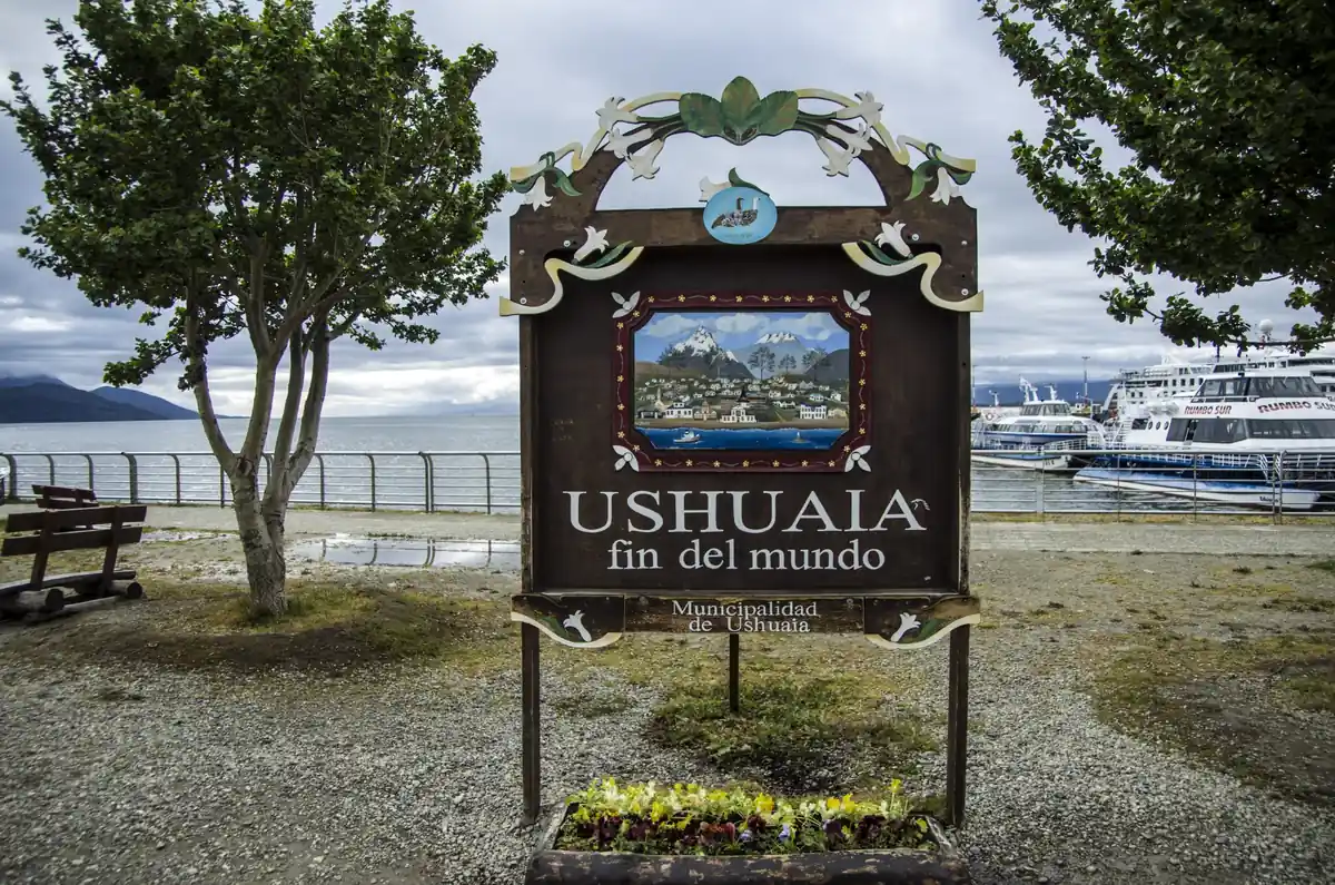 Ushuaia fin del mundo welcome sign on the waterfront next to the port, the arrival point of the transfer from Punta Arenas